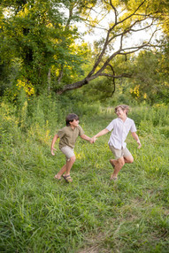boys running in field