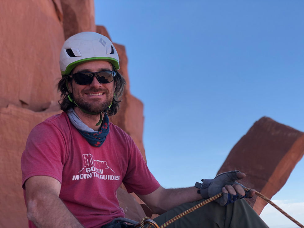 A rock guide working on Castleton Tower in Moab Utah