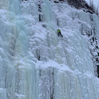 Ice climbing an ice fall in Alaska
