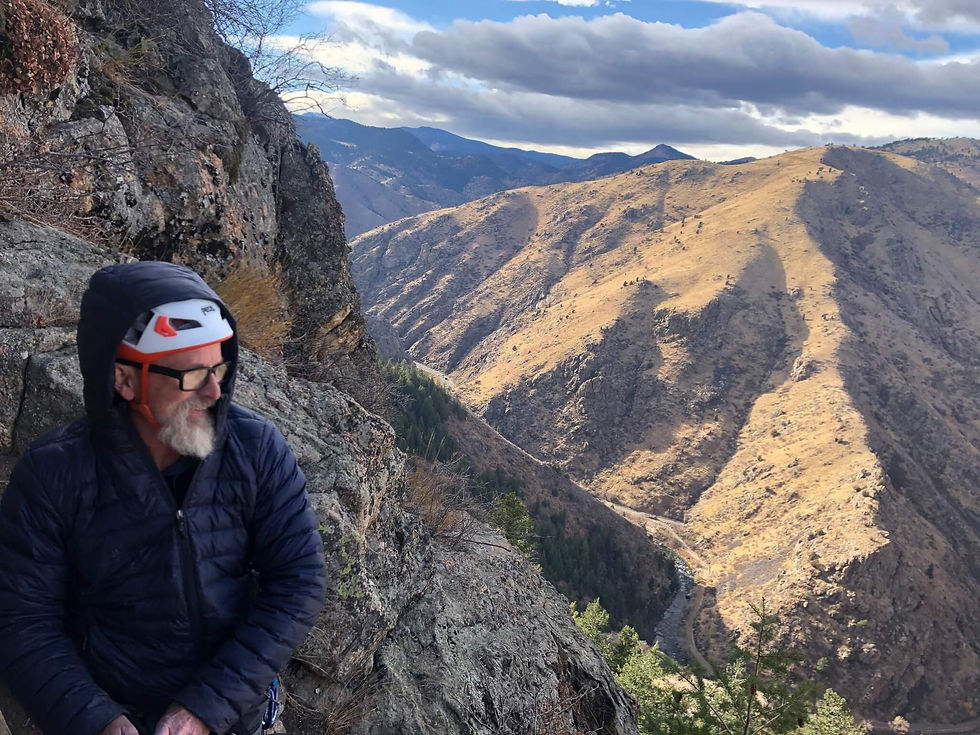 A climber on top of the Tiers of Zion in Clear Creek Canyon