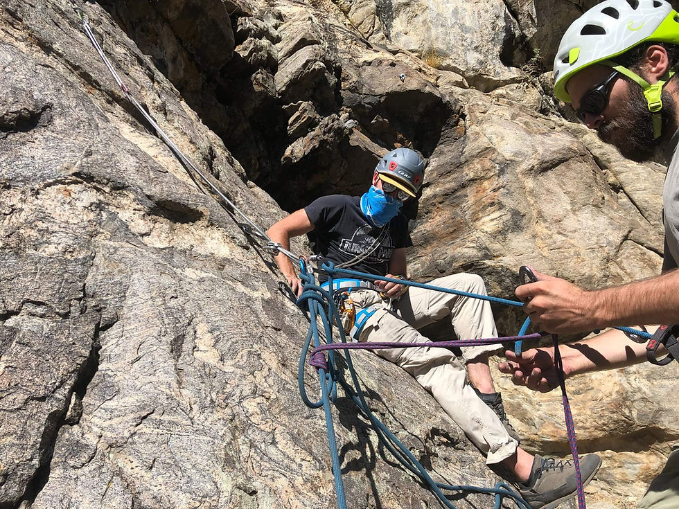 Two climbers practicing self rescue in Clear Creek Canyon