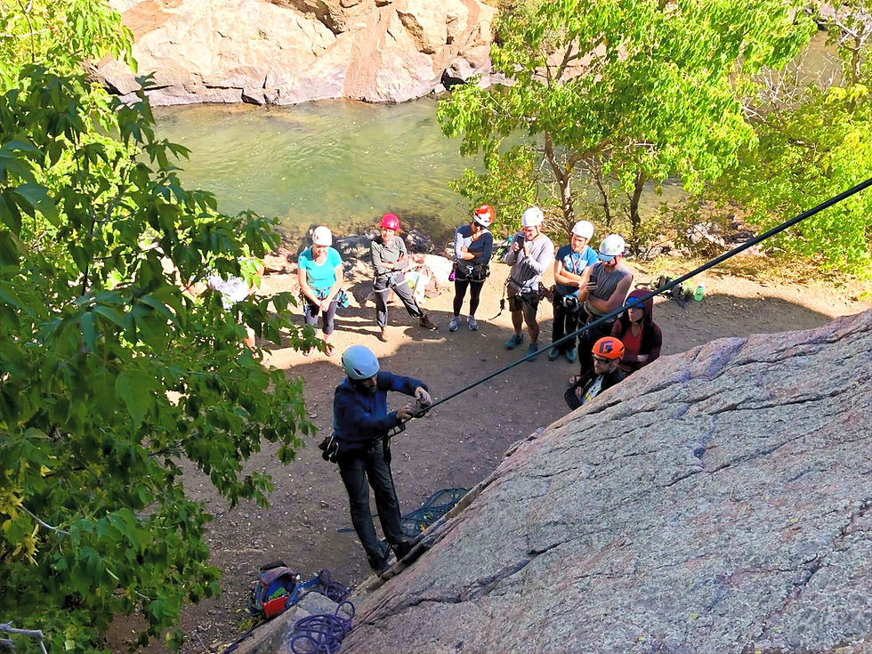 Climbing guide teaching self rescue skills