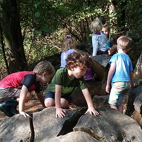 Kids Climbing on Rocks