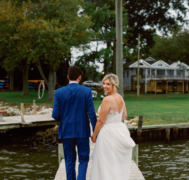 Couple walking on the pier with the venue in the background. Maryland Waterfront Wedding Venues
Chesapeake Bay Waterfront Wedding Venues
Baltimore Waterfront Wedding Venues
