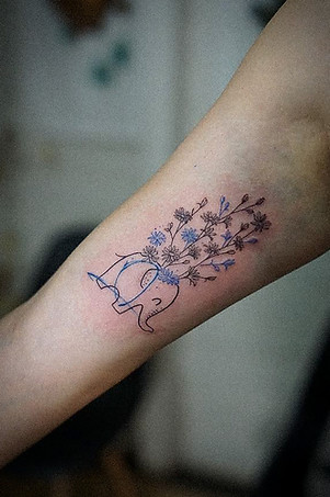 Best Fine line Thai elephant tattoo with flowers by Baan Khagee Tattoo Chiang Mai, Thailand
