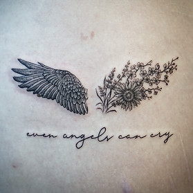 Best Blackwork wings tattoo with sunflower, blossom and lavender by Baan Khagee Tattoo Chiang Mai, Thailand