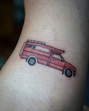 Best Chiang Mai red truck tattoo by Baan Khagee Tattoo Chiang Mai, Thailand