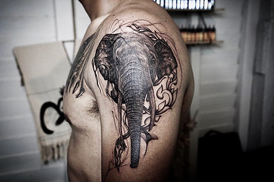 Best Realistic half Thai half African elephant tattoo by Nate, a tattooist in Chiang Mai, Thailand