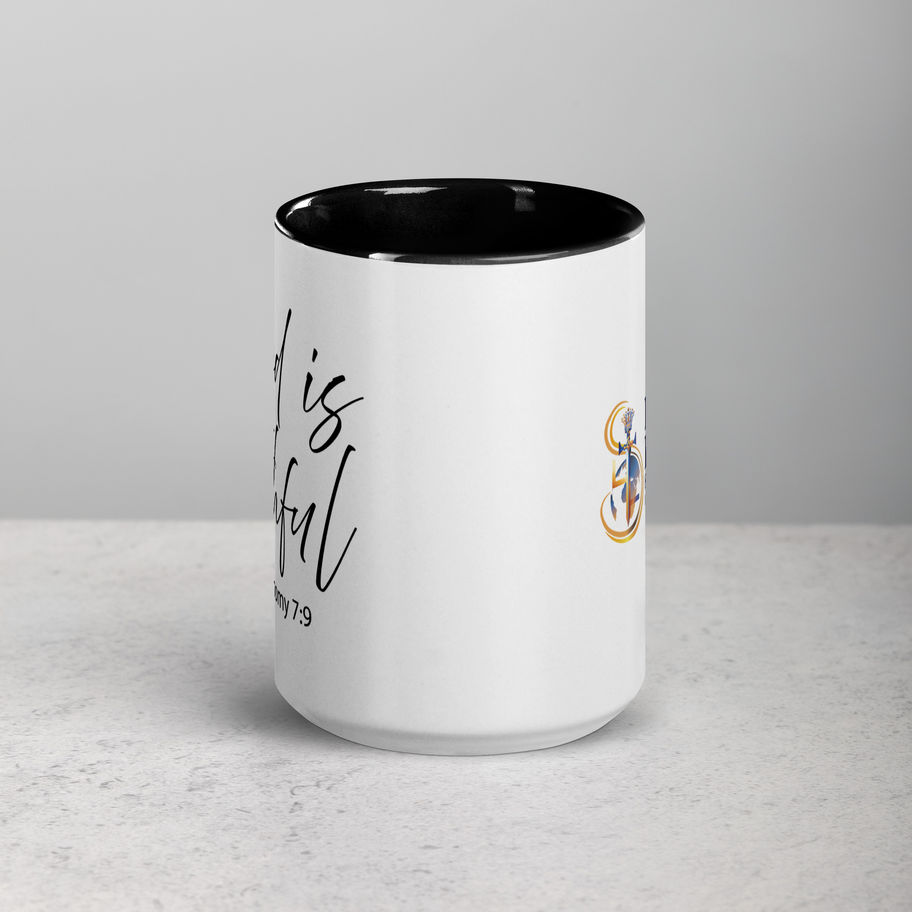 White mug with black rim, God is Faithful text, and a gold anchor design