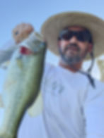 David Wrenn holding a Large Mouth Bass.