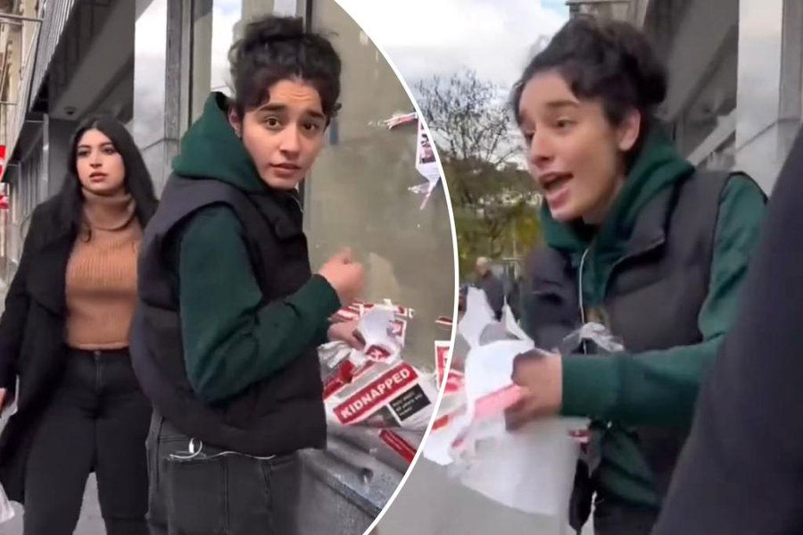 Two Sisters Ripping Down Hostage Posters