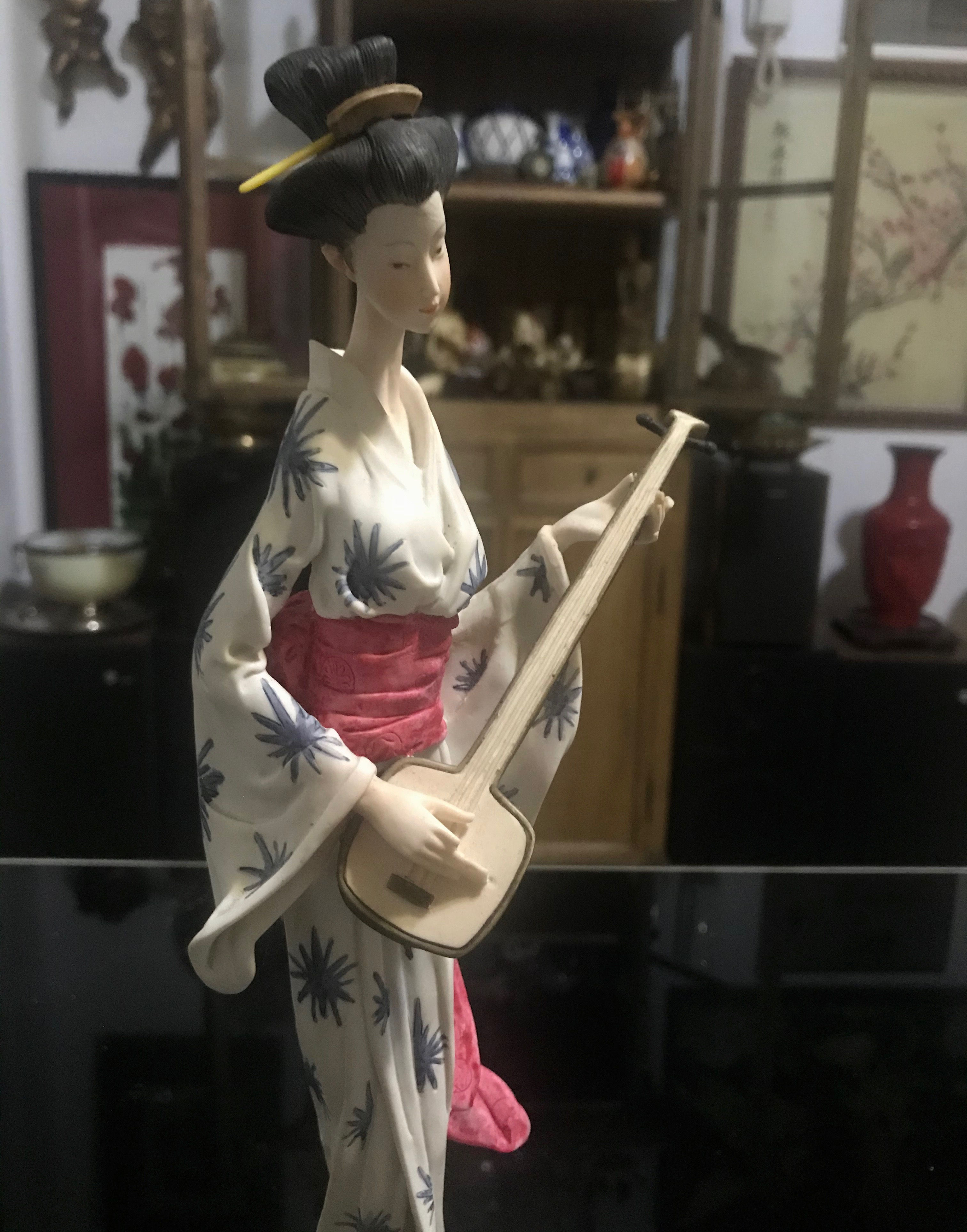 Geisha suonatrice Japan
