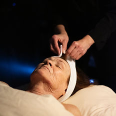 Client receiving a recovery facial