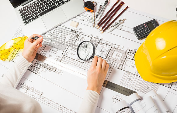 architect-making-plan-with-loupe.jpg