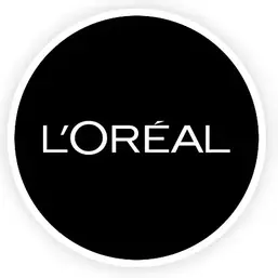 Logo de L’Oréal – compañía internacional que recibió formación en servicio al cliente y desarrollo de equipos de alto desempeño.