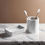 Thumbnail: Portaspazzolino e portasaponetta in marmo di carrara appoggiate sul lavello in marmo