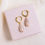 Thumbnail: Long Pink Pearl Charm Creole Earring