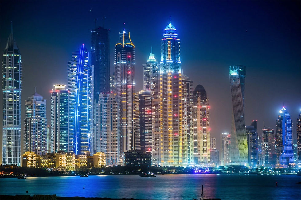 UAE Dubai Marina by night and the glowing lights and architecture, world cruise