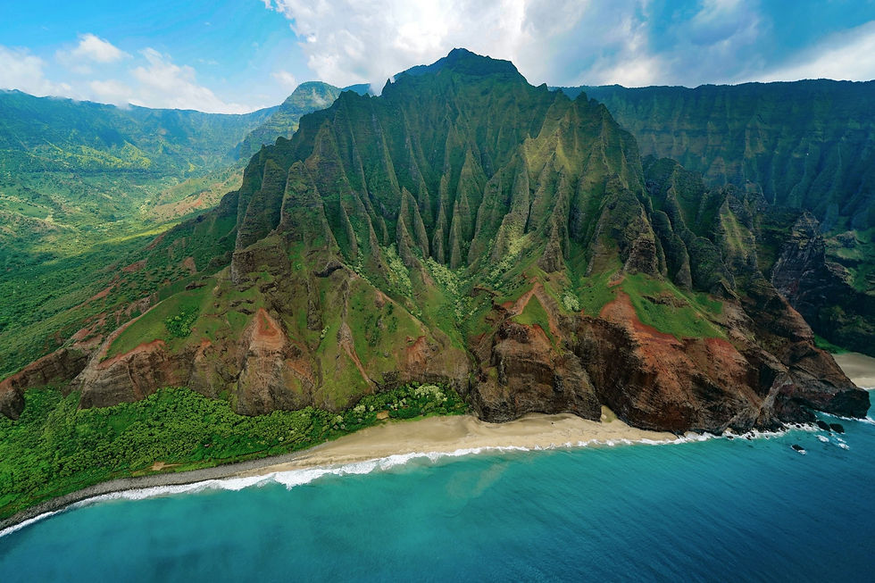Blue seas and green mountainside ridges of Kauai's Napali Coast in the Hawaiian Islands