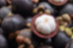 Mangosteen on sale at a market stall in Southeast Asia
