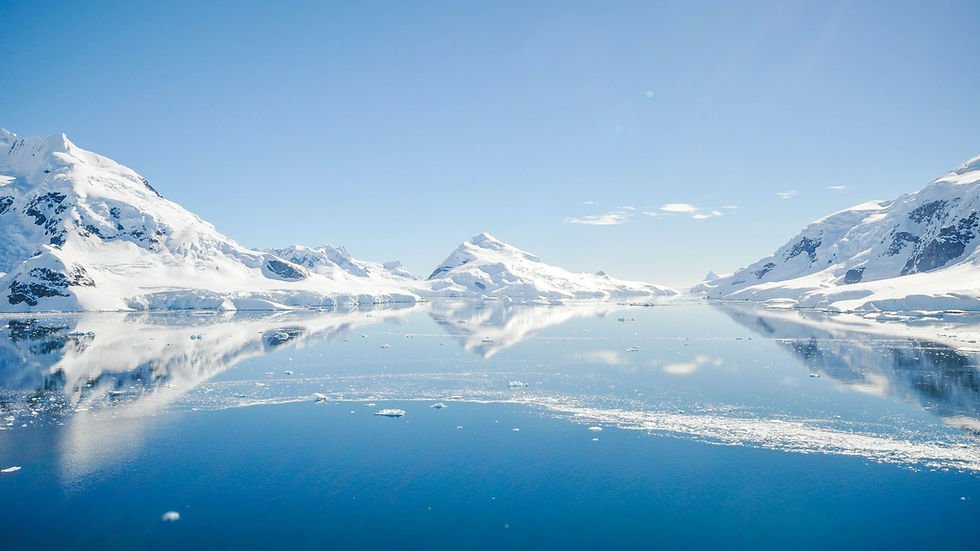 Ice and mountains over cold Antarctic waters of Elephant Island as seen on cruise of the world
