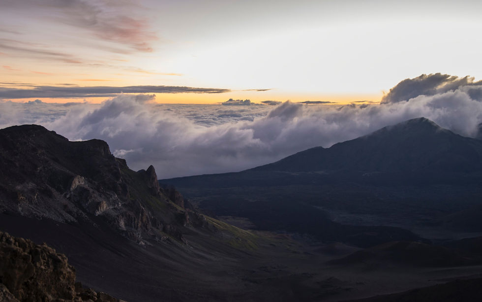 Sunrise over the clouds as seen from the top of Mount Haleakala in Hawaii