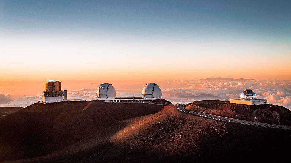 Like something out of a science fiction movie, the Mauna Kea Observatories looking out over Hawaii's clouds