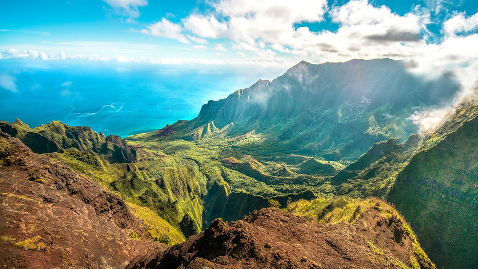 Green slopes of Kauai's Napali Coast. Experience once in a lifetime views between local cultural attractions cruising the best of the Hawaiian Islands with Norwegian