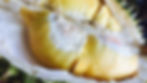 Durian fruit flesh and lobes within an open fruit