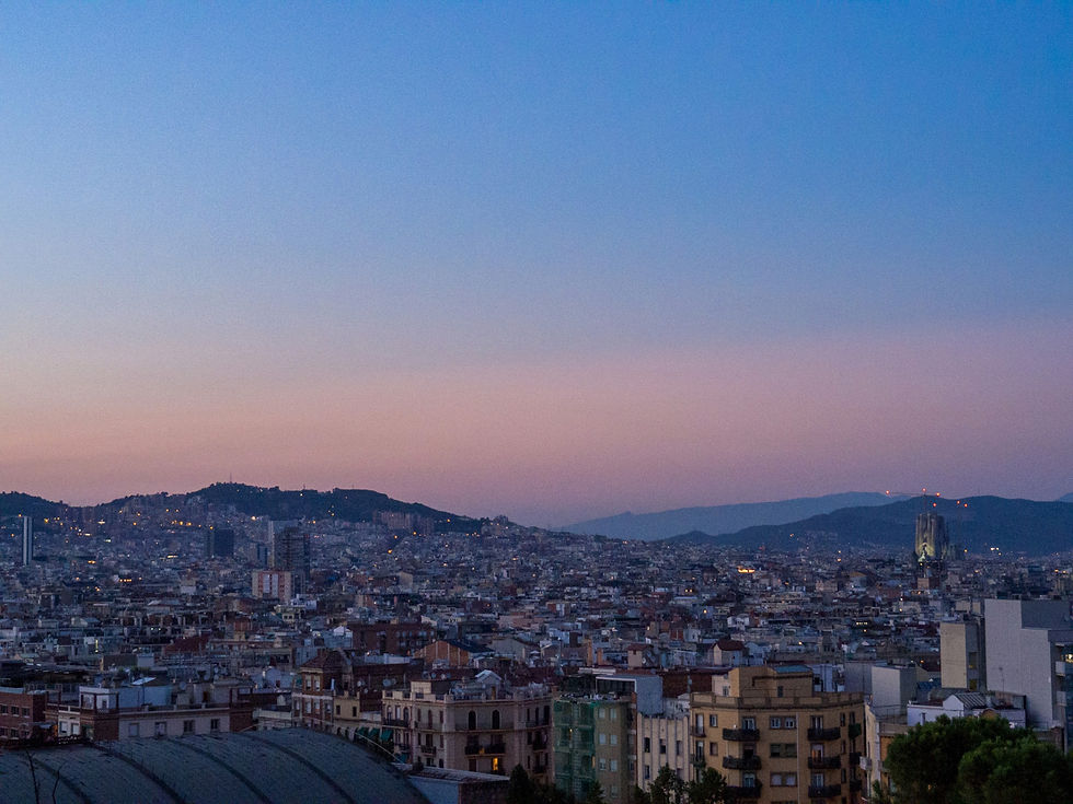 The setting of the sun over Barcelona from Montjuic, Spain