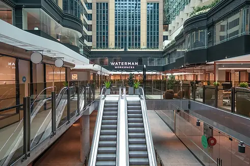 Waterman-Collins-Street-Coworking-Centre-in-Melbourne-CBD-Escalator-Entrance.webp