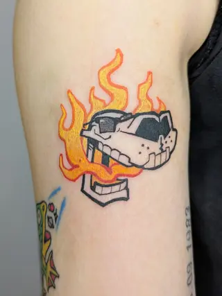 flaming cheeto illustrative tattoo