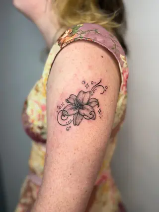 lily flower with abstract lines illustrative tattoo