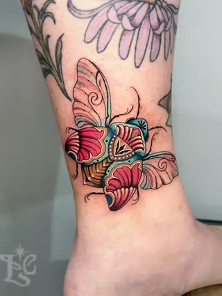 beatle art deco illustrative tattoo