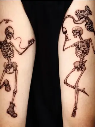 dancing skeletons with abstract lines illustrative tattoo