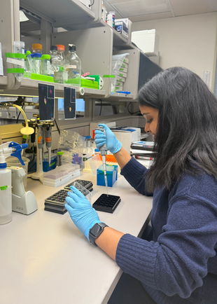 Shruthi receiving an award for her research presentation at the 2024 VCP International Scientific Co