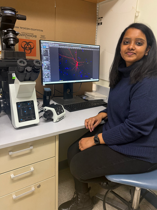 Shruthi receiving an award for her research presentation at the 2024 VCP International Scientific Co