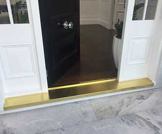 Natural finish brass doorstep