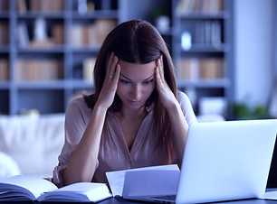 Stressed%20young%20woman%20holding%20hea