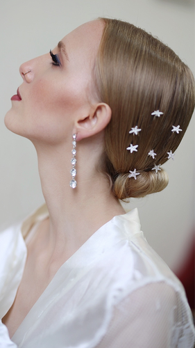 Bridal makeup and hair showcasing a natural, soft glam look by Ieva Genovesi