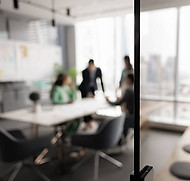 Business people busy, meeting around a table