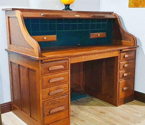"Restored roll top desk with Scandinavian oil and painted pigeon holes black." - Sue