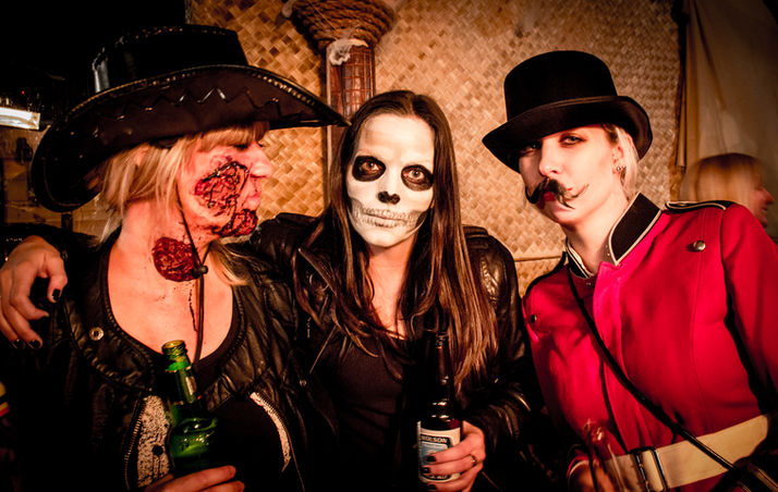 Halloween Event guests holding beer