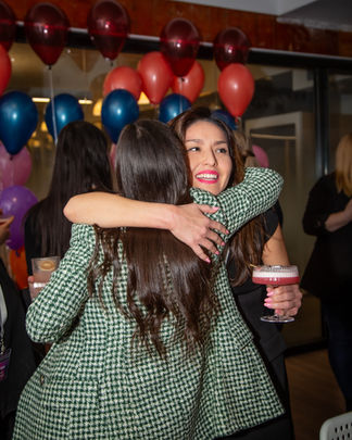 Women hugging at a party