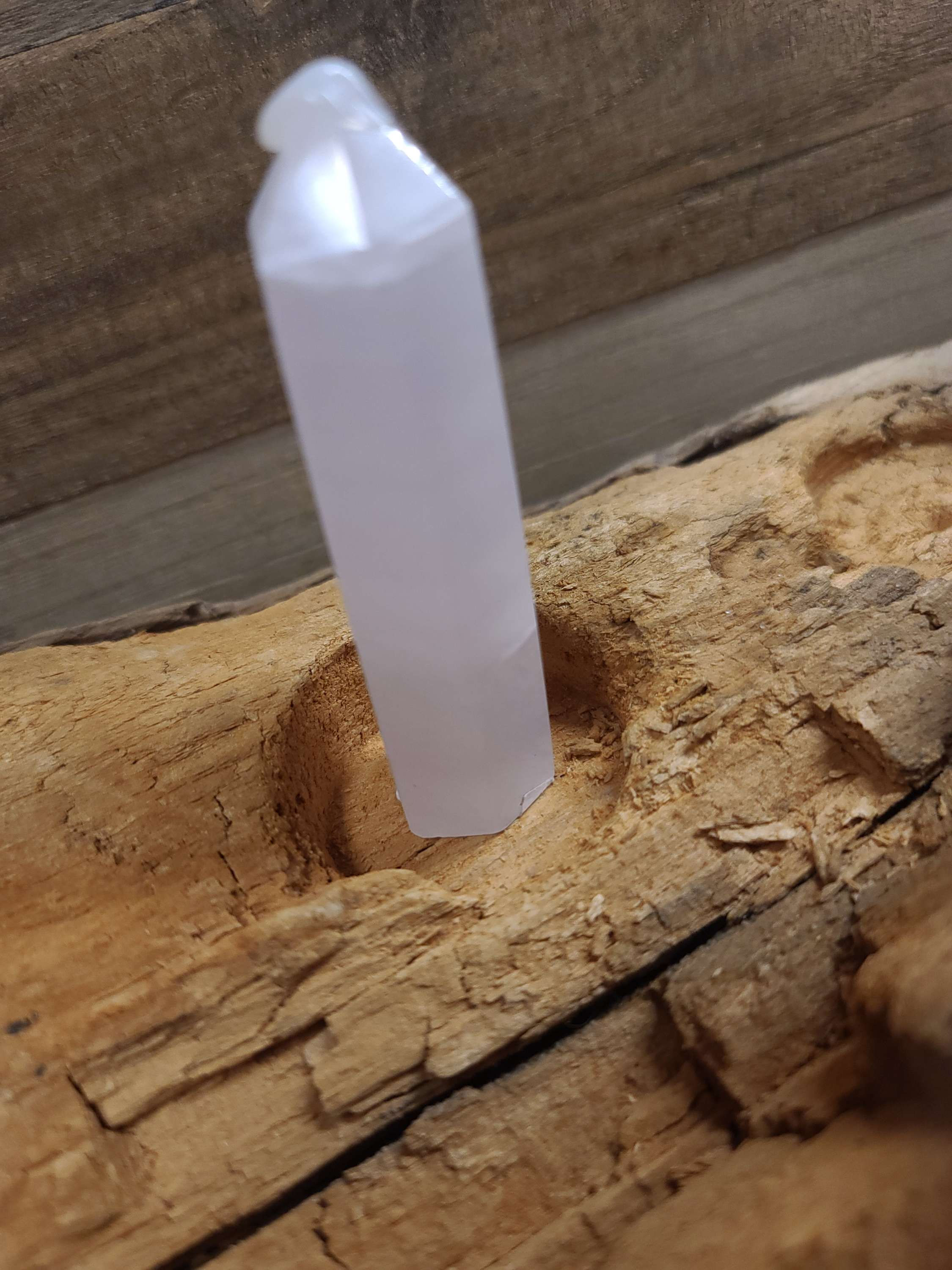 Pink calcite tower crystal with tons of uv glow