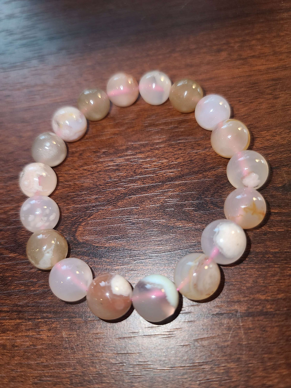 Thumbnail: Pink uv reactive Sakura flower agate crystal bracelet