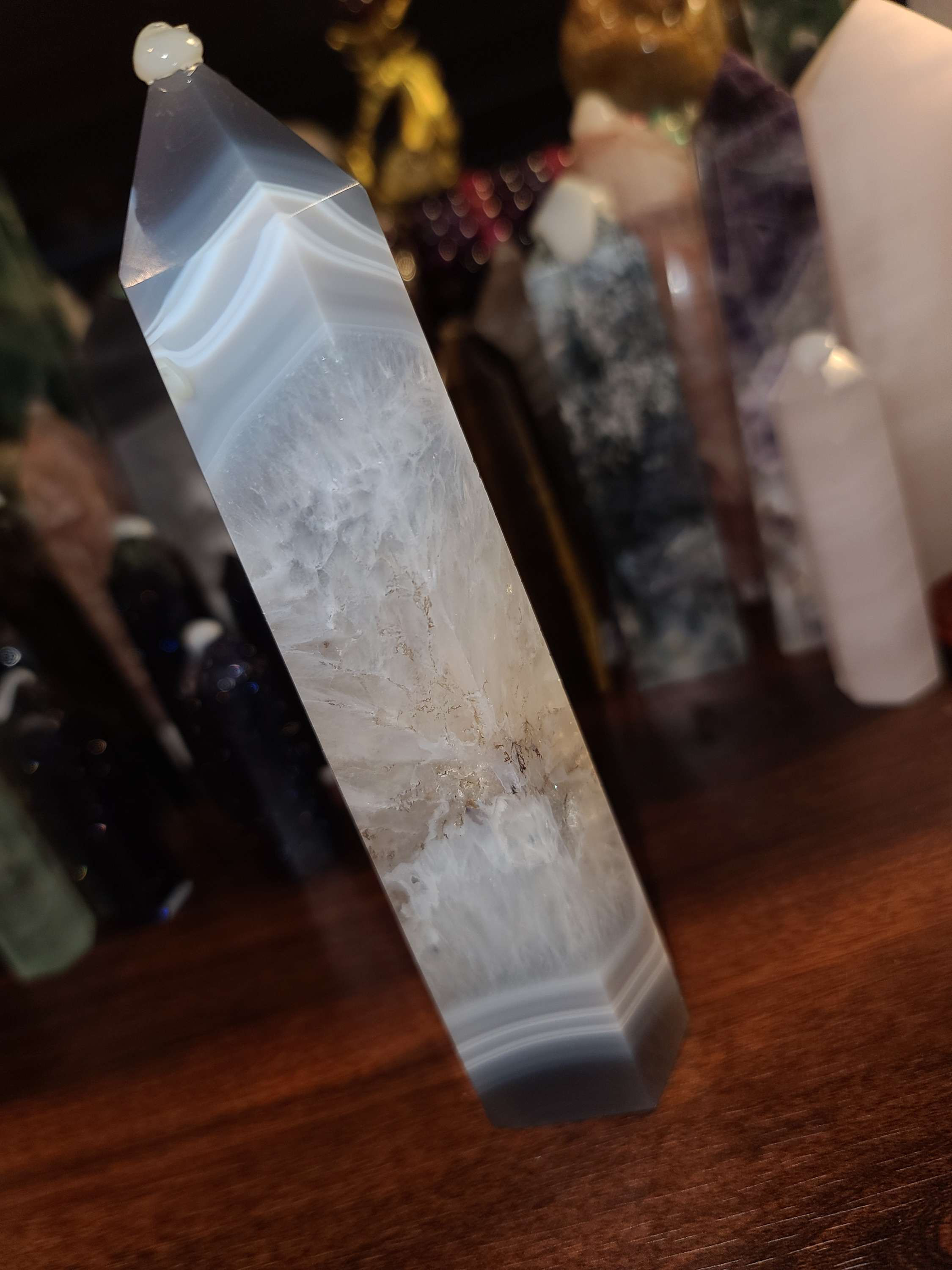 Beautiful banded blue agate with quartz crystal tower