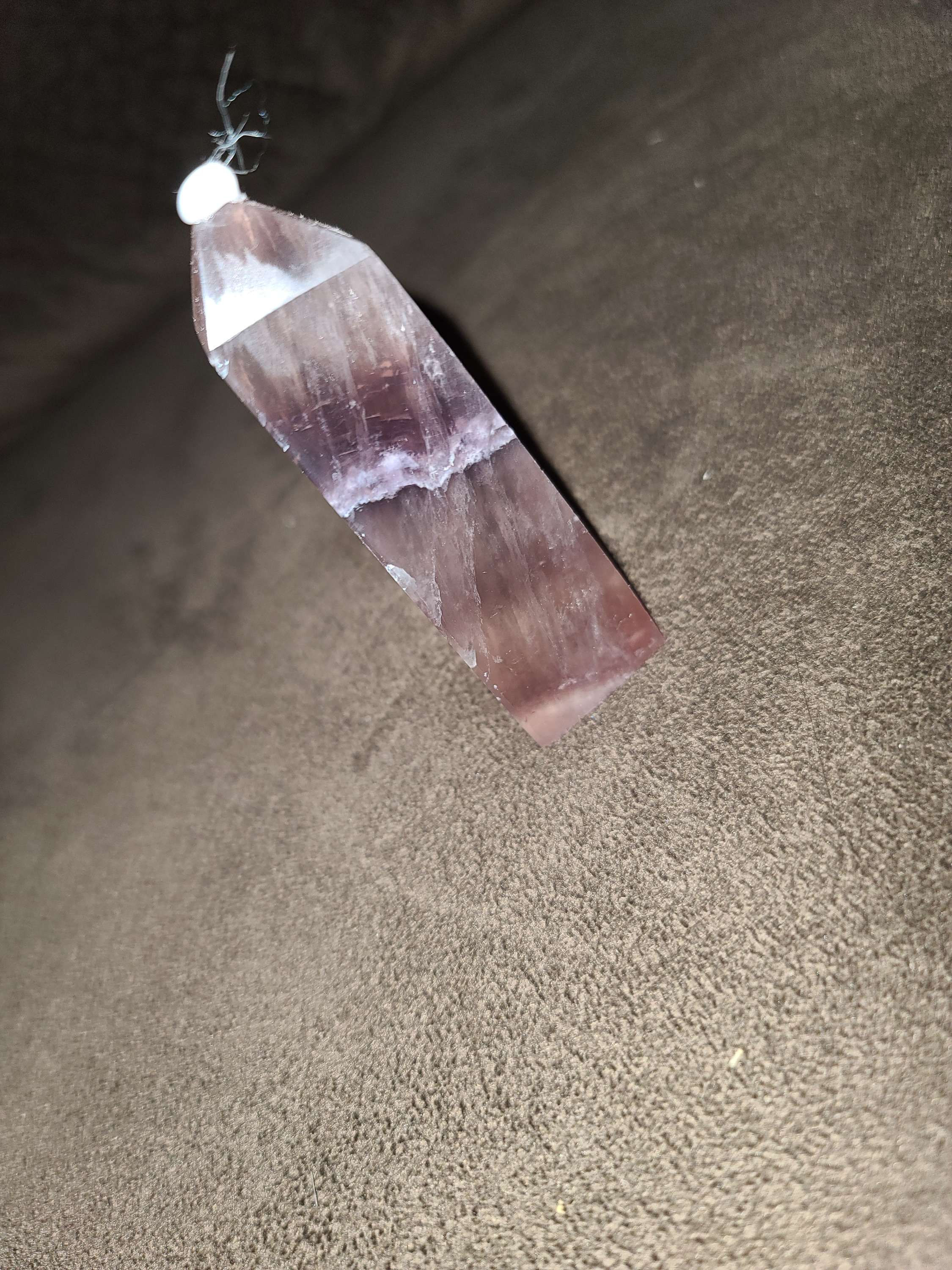 Fluorite crystal tower with lots of striations 