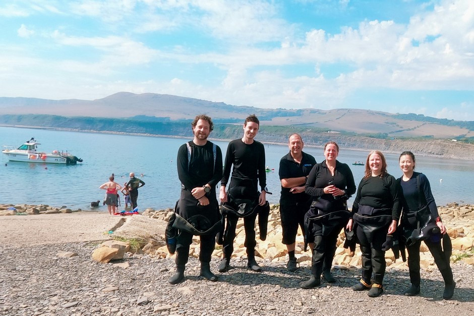 Happy divers on a glorious Jurassic day.