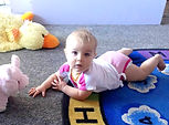 Baby on floor playing at Big Sky Country Preschool, Kalispell, MT